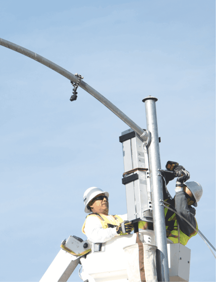 Two electricians restoring power